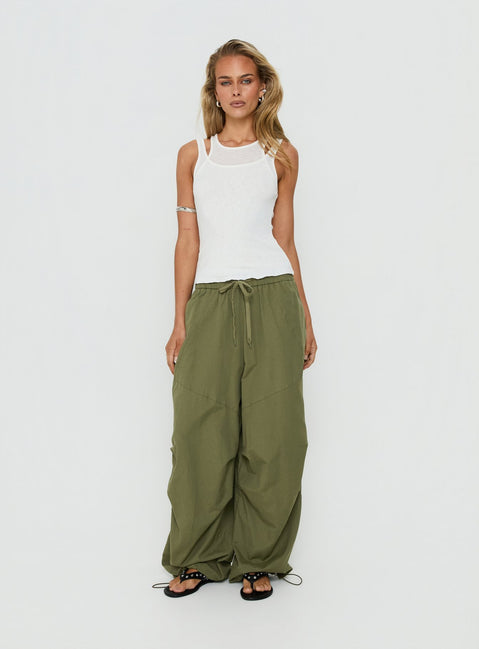 Experience the Mankind Baggy Cargo Pants Olive in womens-regular-pants featuring mid-rise waist detail view of model wearing Princess Polly