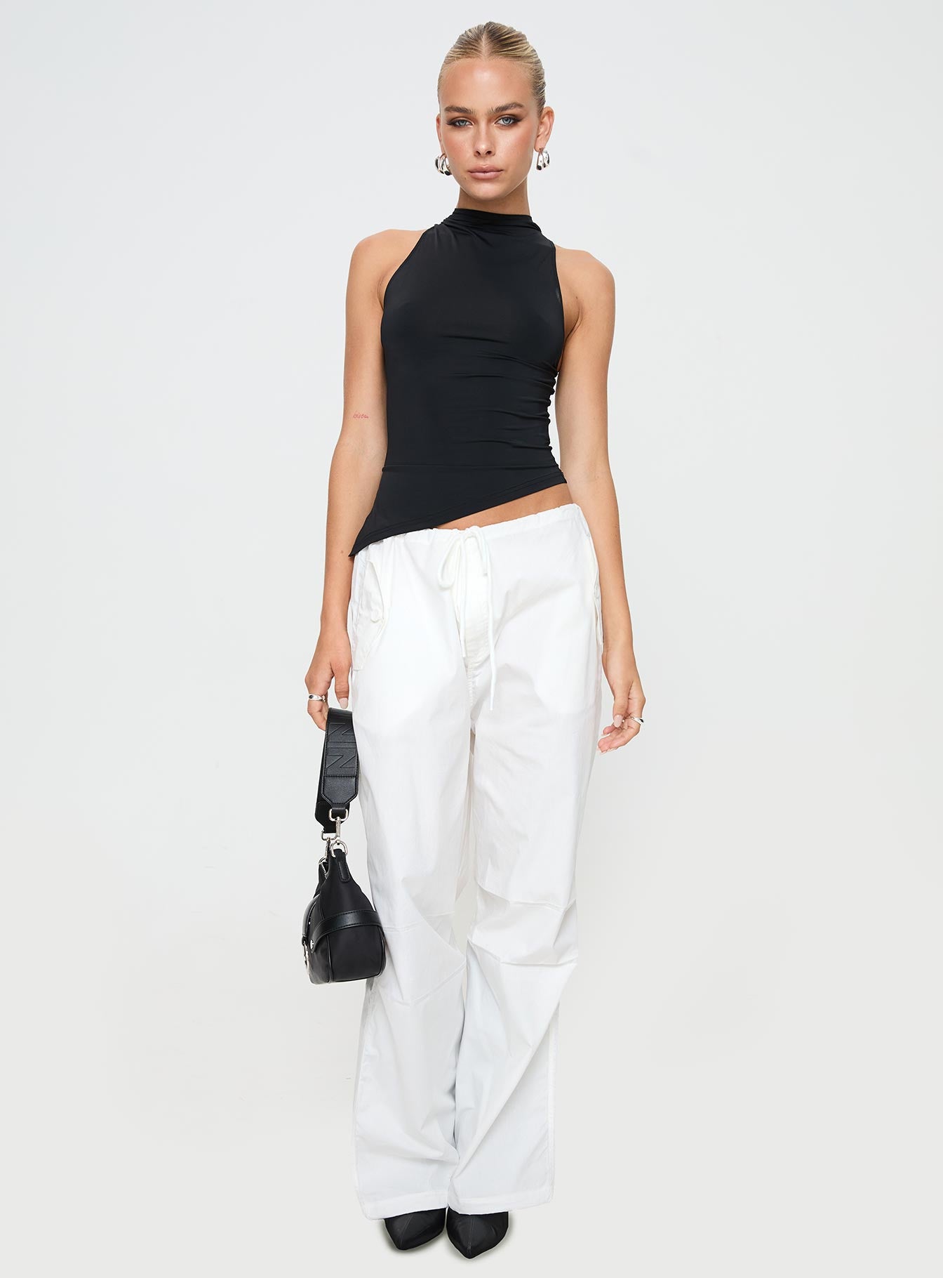 front view of model wearing Princess Polly Blessings Tie Front Cotton Pant White Low Rise Pants 