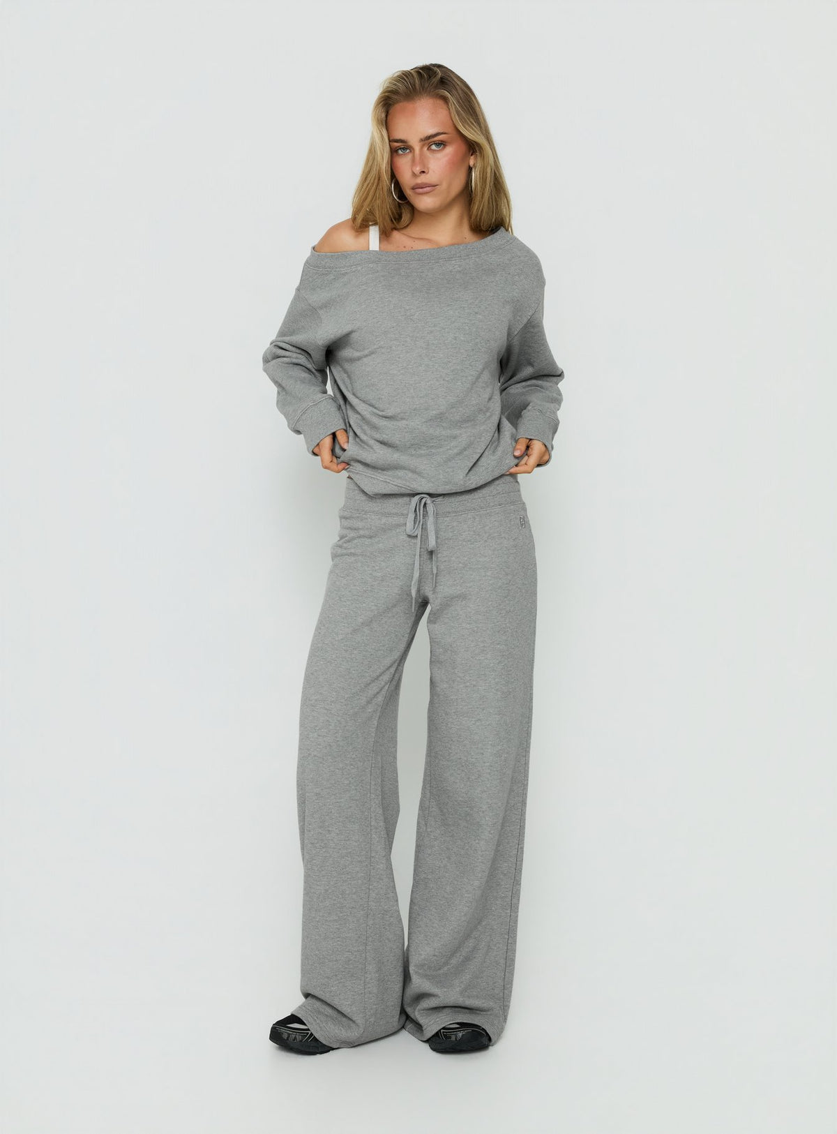 Showcasing the Dodie Wide Leg Pants Dark Grey Marle in womens-regular-pants with mid-rise front view of model wearing Princess Polly
