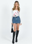   side view of model wearing Princess Polly Zakai Cargo Mini Skirt Mid Wash Denim Tall Mini Skirts 