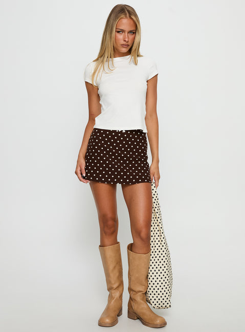 back view of model wearing Princess Polly Tejano Mini Skirt Brown Polka Dot Mini Skirts 