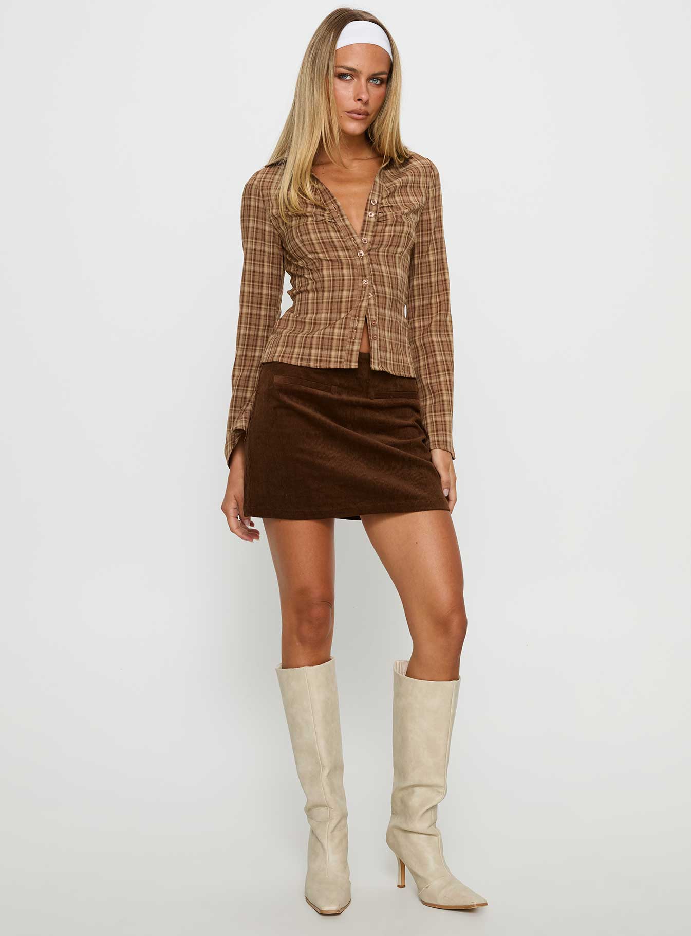   side view of model wearing Princess Polly Araceli Corduroy Mini Skirt Brown Mini Skirts 
