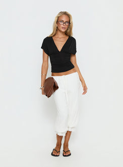 front view of model wearing Princess Polly Basma Bloomer Trouser Pants Rayon White Mid Rise Pants 