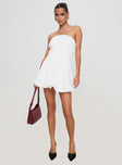 side view of model wearing Princess Polly Karenza Bubble Hem Mini Dress White Straight Neck 