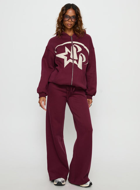side view of model wearing Princess Polly Princess Polly Stargirl Zip Through Jumper Burgundy 