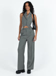 Matching set Vest top  Lapel collar  Button front fastening  High waisted pants  Zip and button fastening  Belt looped waist  Twin hip pockets  Elasticated back Wide leg 