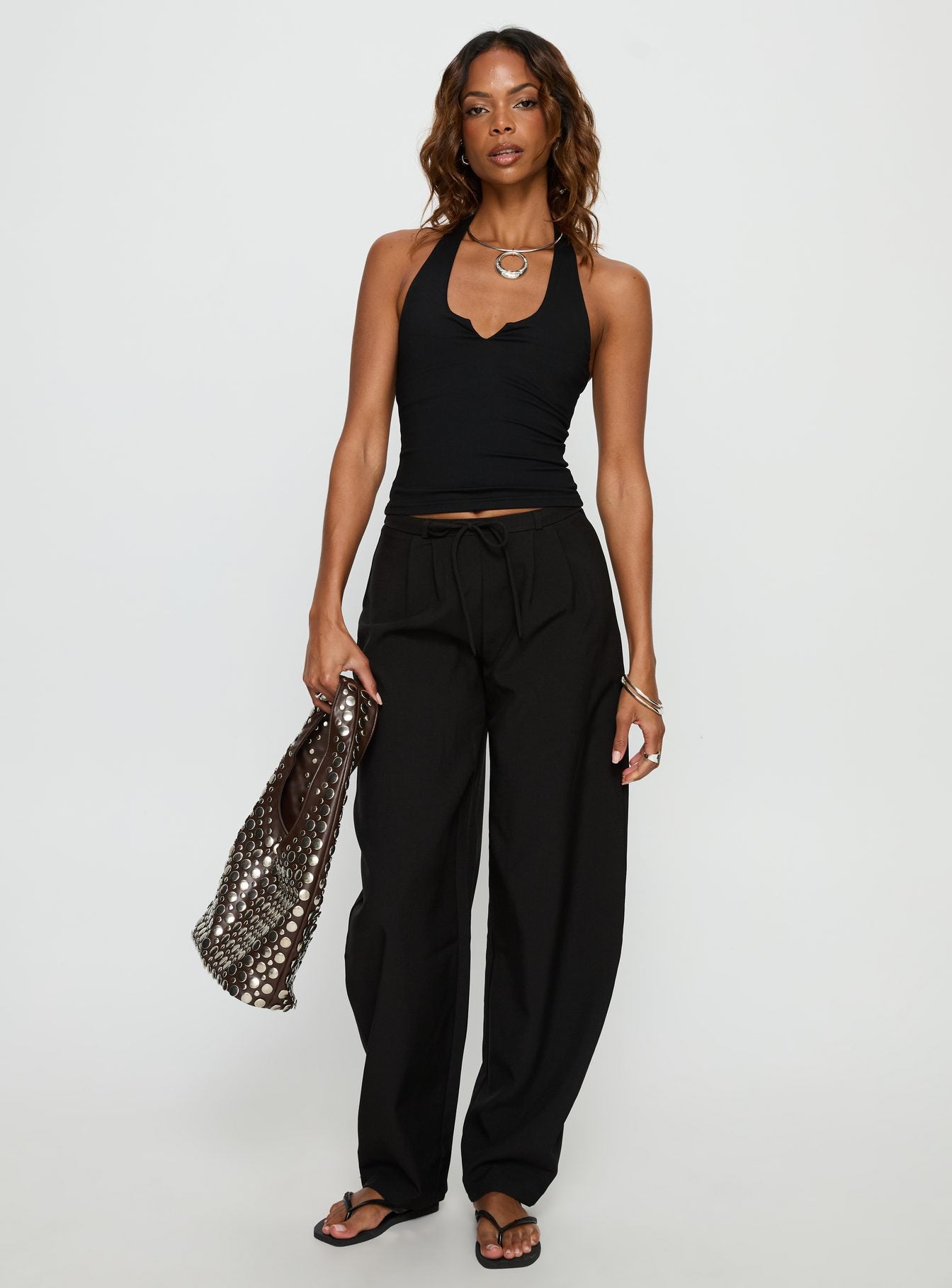 front view of model wearing Princess Polly Triffid Barrel Leg Pants Black High Rise Pants 