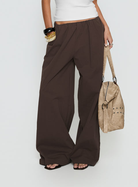 Showcasing Lunea Concealed Waistband Pants Brown Tall in womens regular pants with high-rise detail view of model wearing Princess Polly