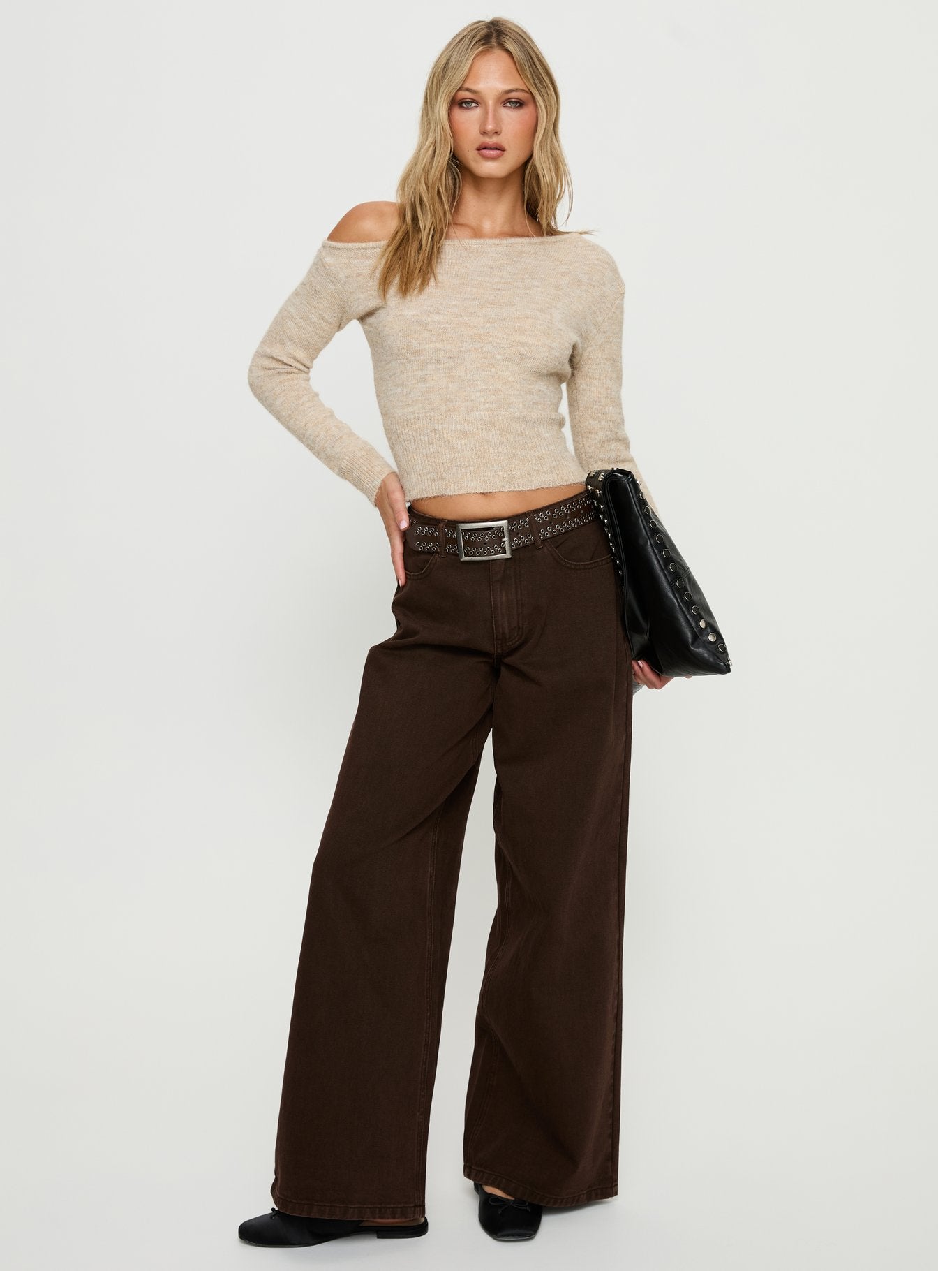 side view of model wearing Princess Polly Naylor Mid Rise Wide Leg Jeans Brown Mid Rise Jeans 