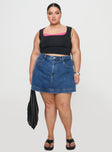 front view of model wearing Princess Polly Gazelle Denim Skort Mid Wash Curve High Waisted Shorts 