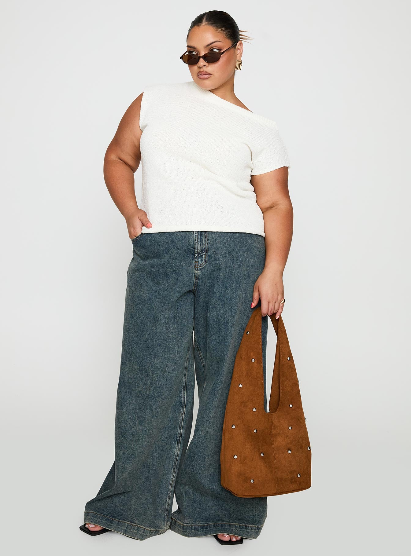 side view of model wearing Princess Polly Ashfield Off Shoulder Top White Curve Short Sleeves Asymmetric Neckline 