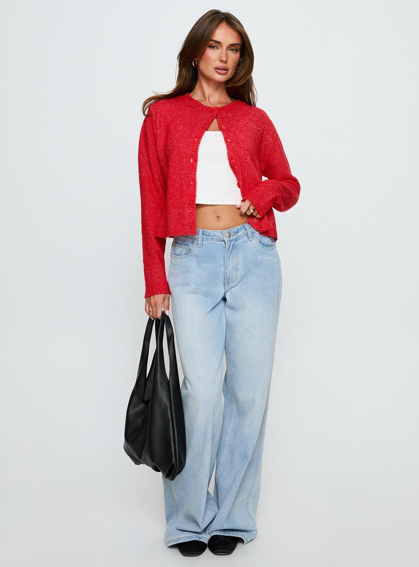 front view of model wearing Princess Polly Denmark Cardigan Red cropped 