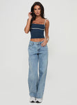 side view of model wearing Princess Polly Serenitia Mid Rise Relaxed Jeans Light Wash Tall Mid Rise 