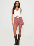 Front view of model wearing  front Cobain Shorts Red Stripe Princess Polly High Waisted Shorts 