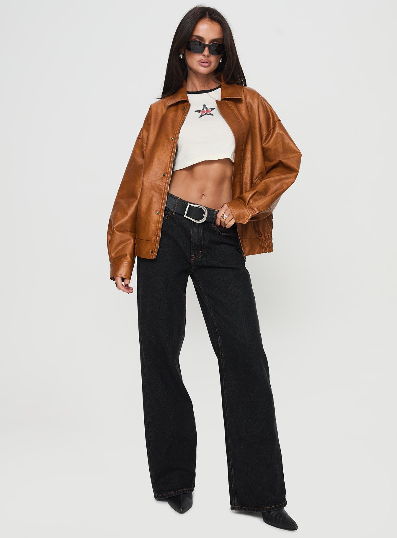 Faux leather bomber jacket Classic collar, zip & button fastening down front, twin hip pockets with press button fastening, elasticated waistband, single button cuff Non-stretch material, fully lined
