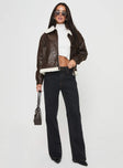 Shearling jacket Oversized fit, classic collar, drop shoulder, exposed zip, twin pockets Non-stretch material, shearling lining