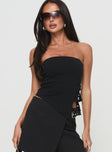 Strapless top Inner silicone strip at bust, twin buckle detail, asymmetric hem Good stretch, unlined 