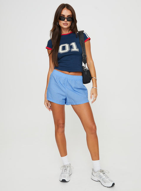 front view of model wearing Princess Polly Maxxy Boxer Shorts Blue Stripe High Waisted Shorts 