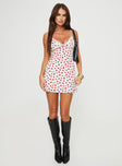 side view of model wearing Princess Polly Karena Mini Dress White / Red Floral Petite Plunger 