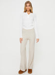 Long sleeve rib knit top Scooped neckline, button fastening at front, subtle pleats at waist Good stretch, unlined  