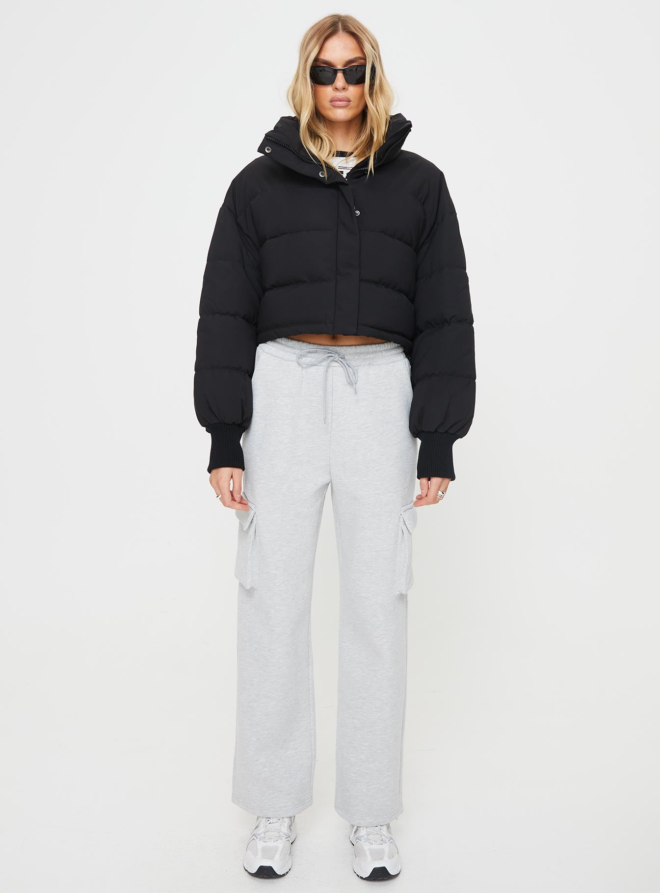 Puffer jacket Snap button fastening at front, mock neck, ribbed cuffs, adjustable drawstring around waist Non-stretch, fully lined Princess Polly Lower Impact 