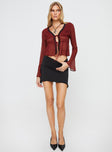 Long sleeve top V neckline, lace trim, twin tie fastening at bust Non-stretch, lined bust Princess Polly Lower Impact