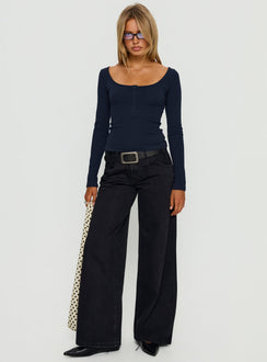 front view of model wearing Princess Polly Supercut Low Rise Baggy Pleat Jeans Washed Black Low Rise Jeans 