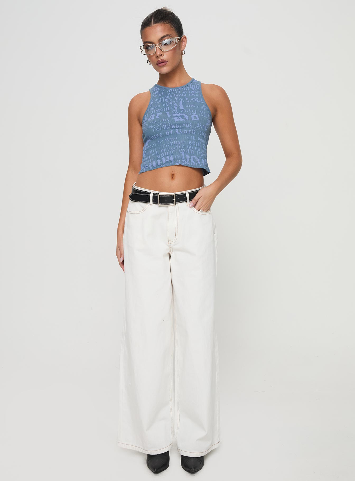 back view of model wearing Princess Polly Abdiel Top Blue Sleeveless Crew Neck 