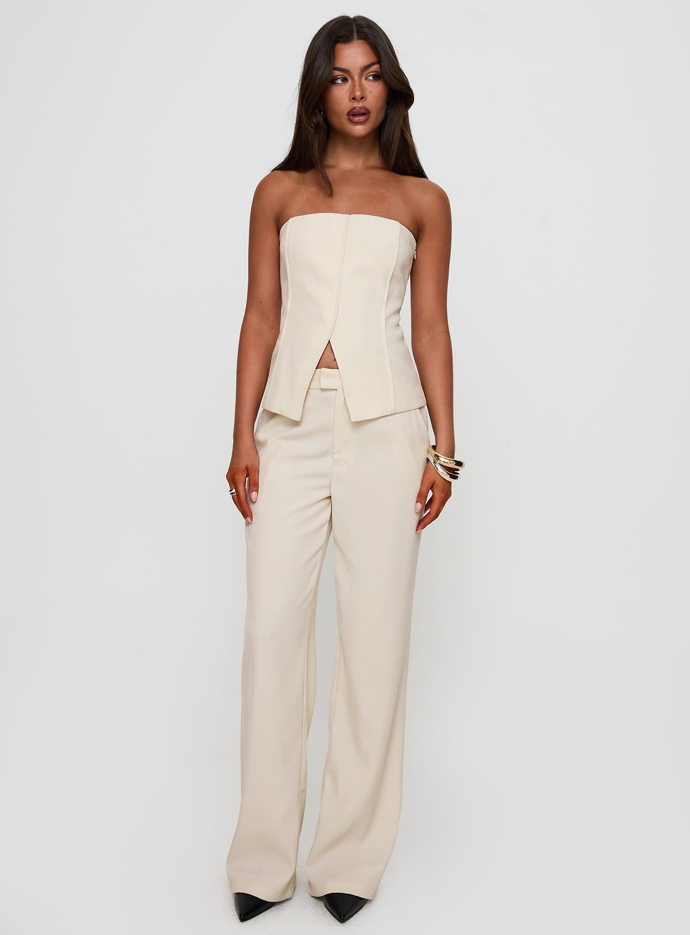 side view of model wearing Princess Polly Lavish Living Strapless Top Cream Sleeveless straight 