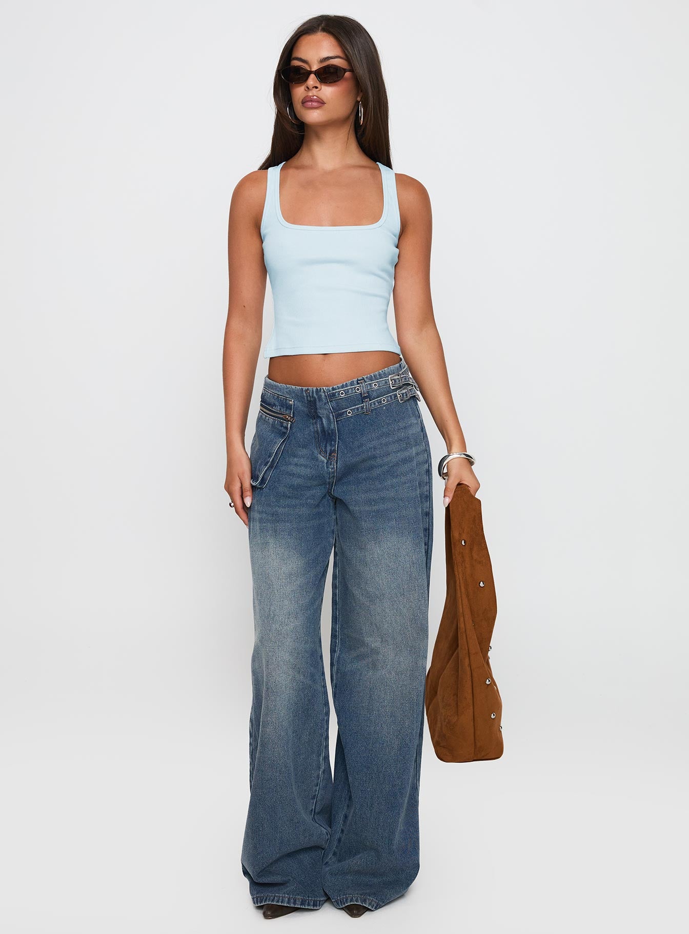 front view of model wearing Princess Polly Paltrow Cargo Jeans Mid Blue Wash Mid Rise 