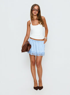   front view of model wearing Princess Polly Orlynn Satin Lace Trim Mini Skirt Blue Mini Skirts 