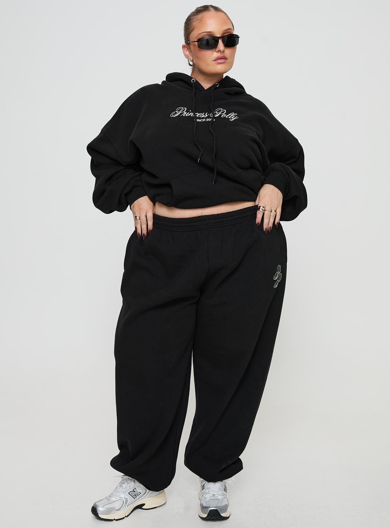front view of model wearing Princess Polly Princess Polly Track Pants Script Black / Ivory Curve 
