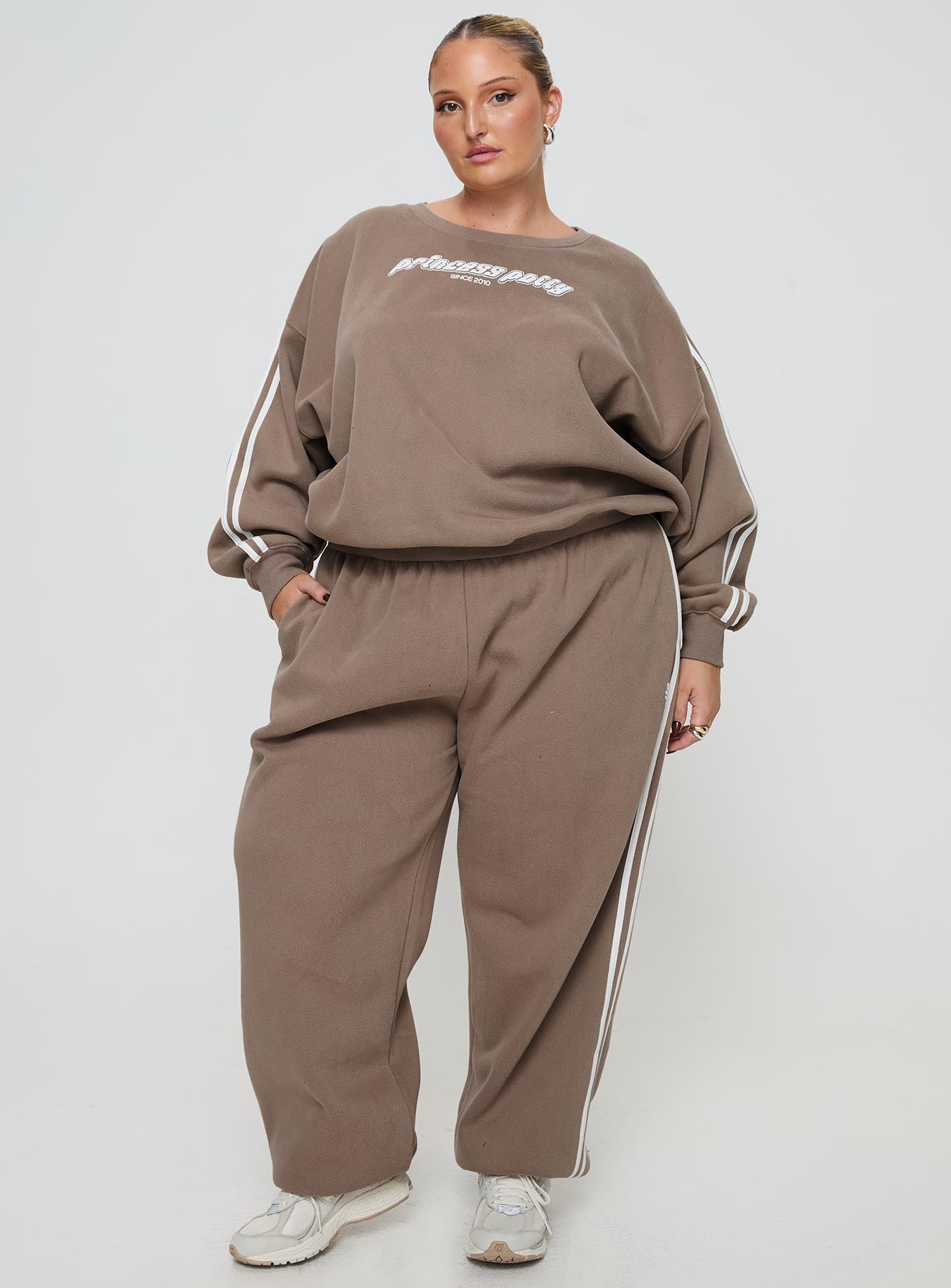 front view of model wearing Princess Polly Princess Polly Crew Neck Sweatshirt Stripe Taupe / White Curve 