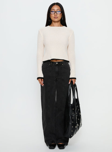 side view of model wearing Princess Polly Lando Low Rise Straight Leg Jeans Washed Black Low Rise Jeans 