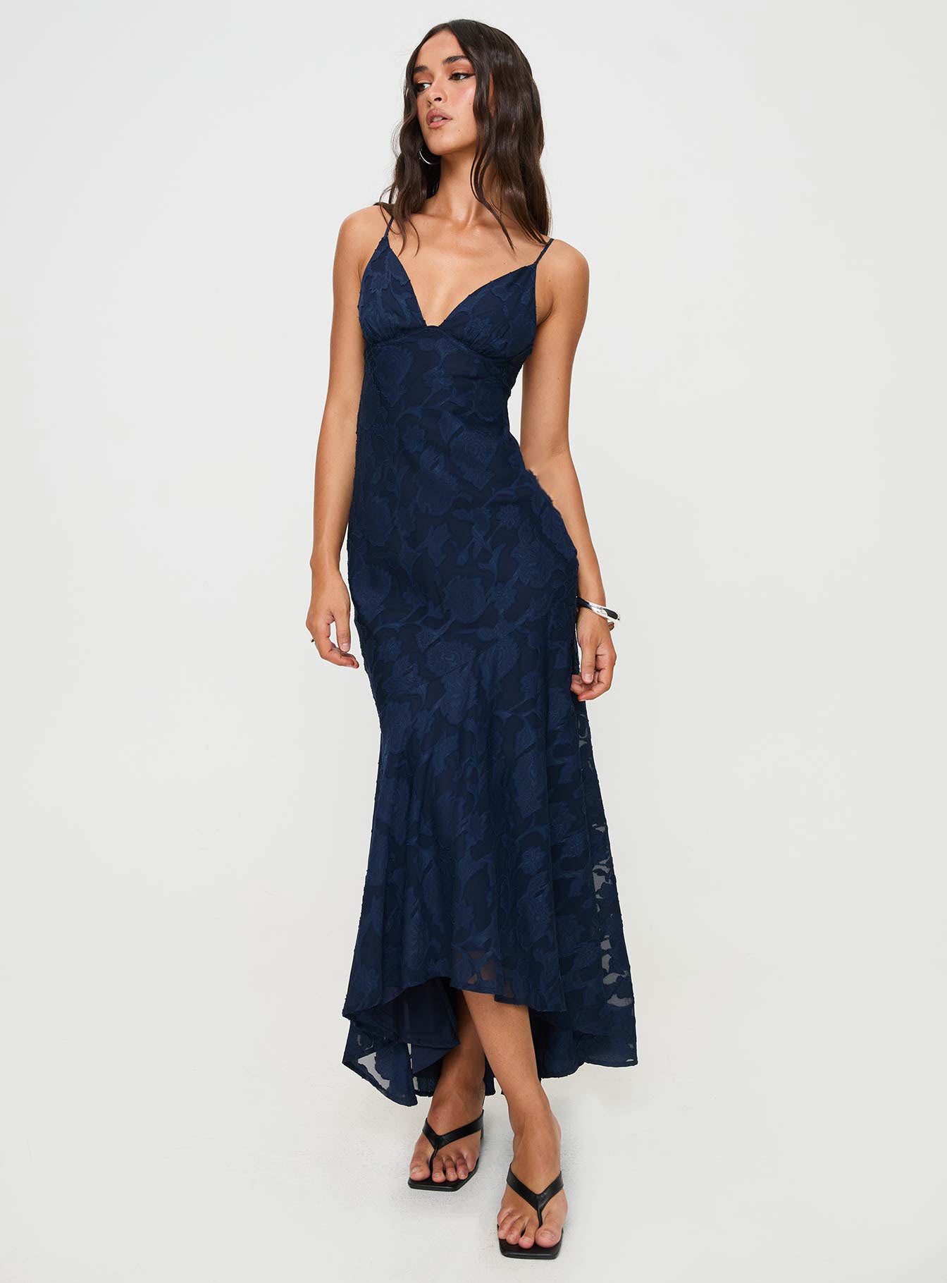 side view of model wearing Princess Polly Cyrene Maxi Dress Navy Plunger 