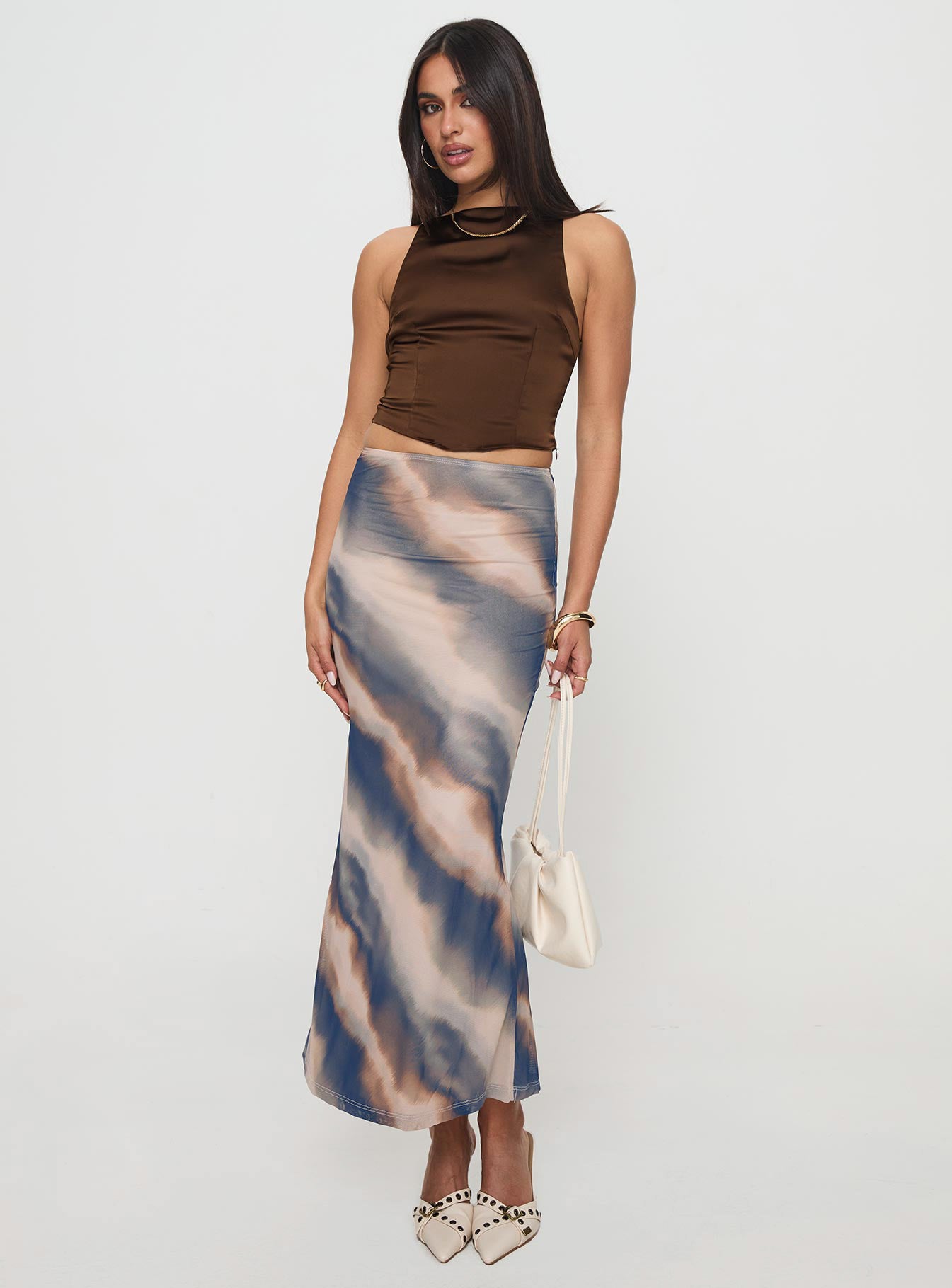 side view of model wearing Princess Polly Ashali Top Dark Brown Sleeveless High Neck 