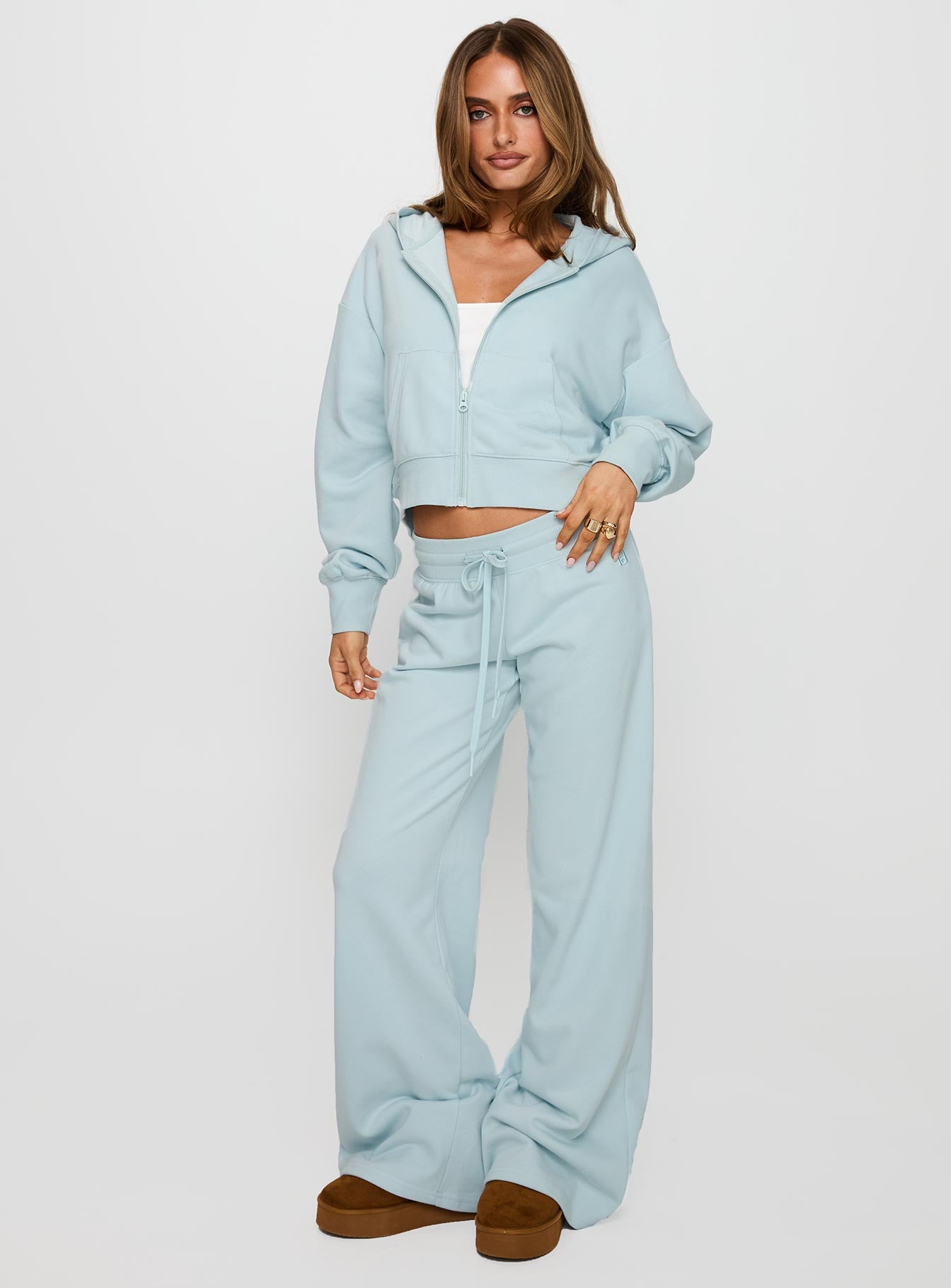 front view of model wearing Princess Polly Mindful Low Rise Pant Blue Low Rise Pants 