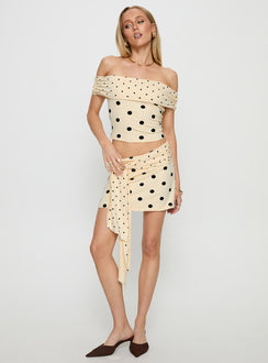   front view of model wearing Princess Polly Porzia Wrap Detail Mini Skirt Cream / Polka Dot Mini Skirts 