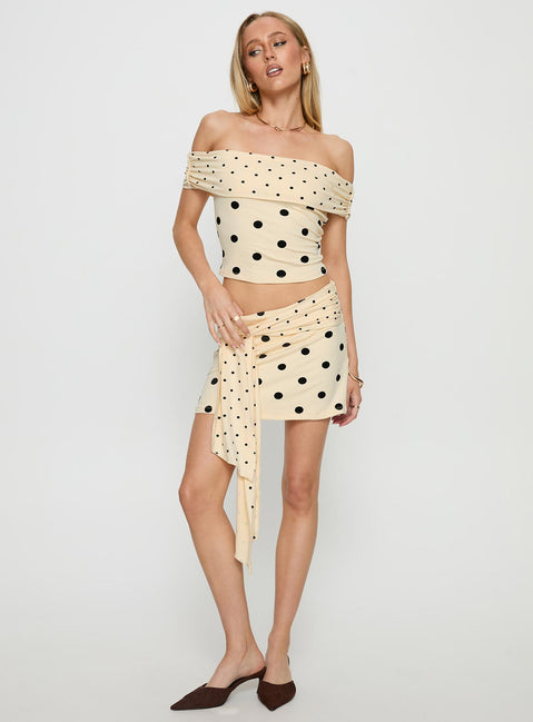   front view of model wearing Princess Polly Porzia Wrap Detail Mini Skirt Cream / Polka Dot Mini Skirts 