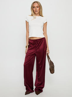 front view of model wearing Princess Polly Soulstar Satin Pants Wine Mid Rise Pants 