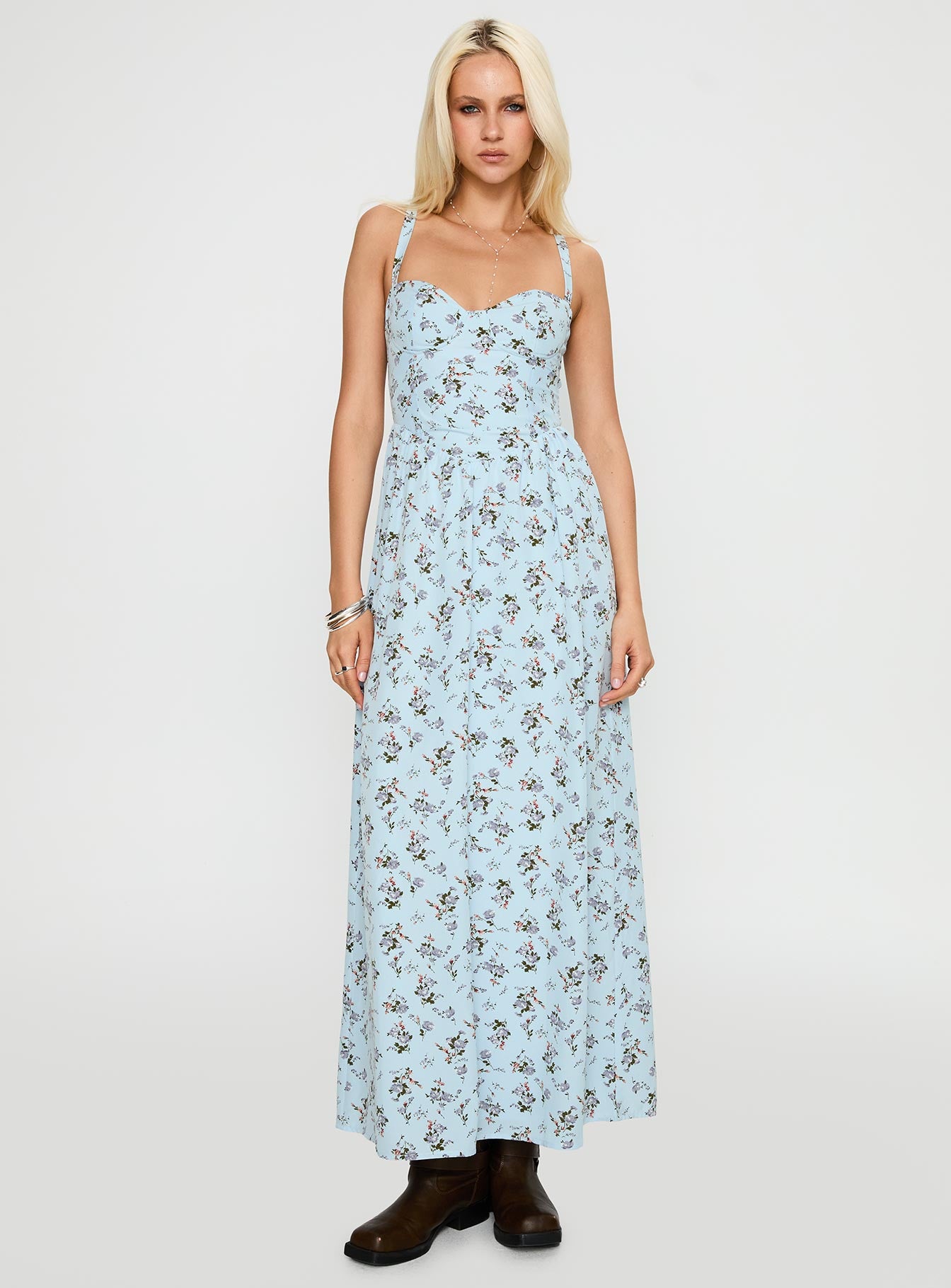 side view of model wearing Princess Polly Izebella Maxi Dress Blue Floral Sweetheart Neckline 