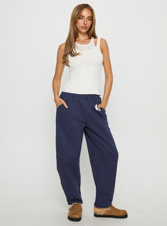 front view of model wearing Princess Polly Route 08 Barrel Track Pant Navy Mid Rise Pants 