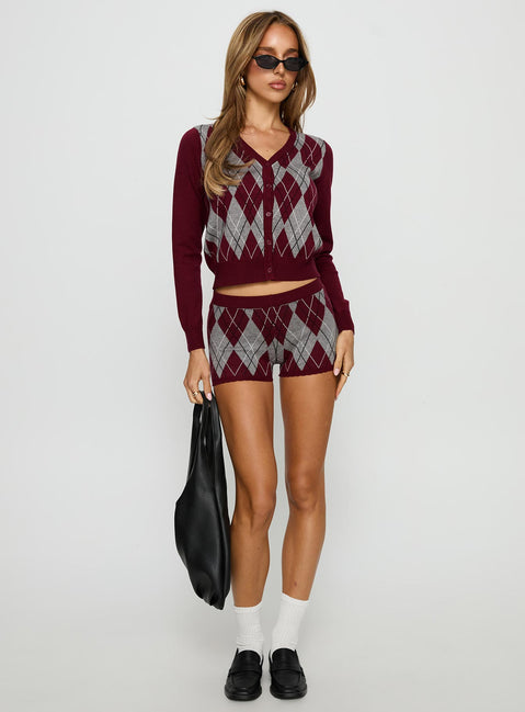 front view of model wearing Princess Polly Raiven Knit Cardigan Burgundy Argyle cropped 