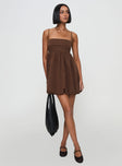 back view of model wearing Princess Polly Layken Bubble Hem Mini Dress Chocolate Tall Square Neck 