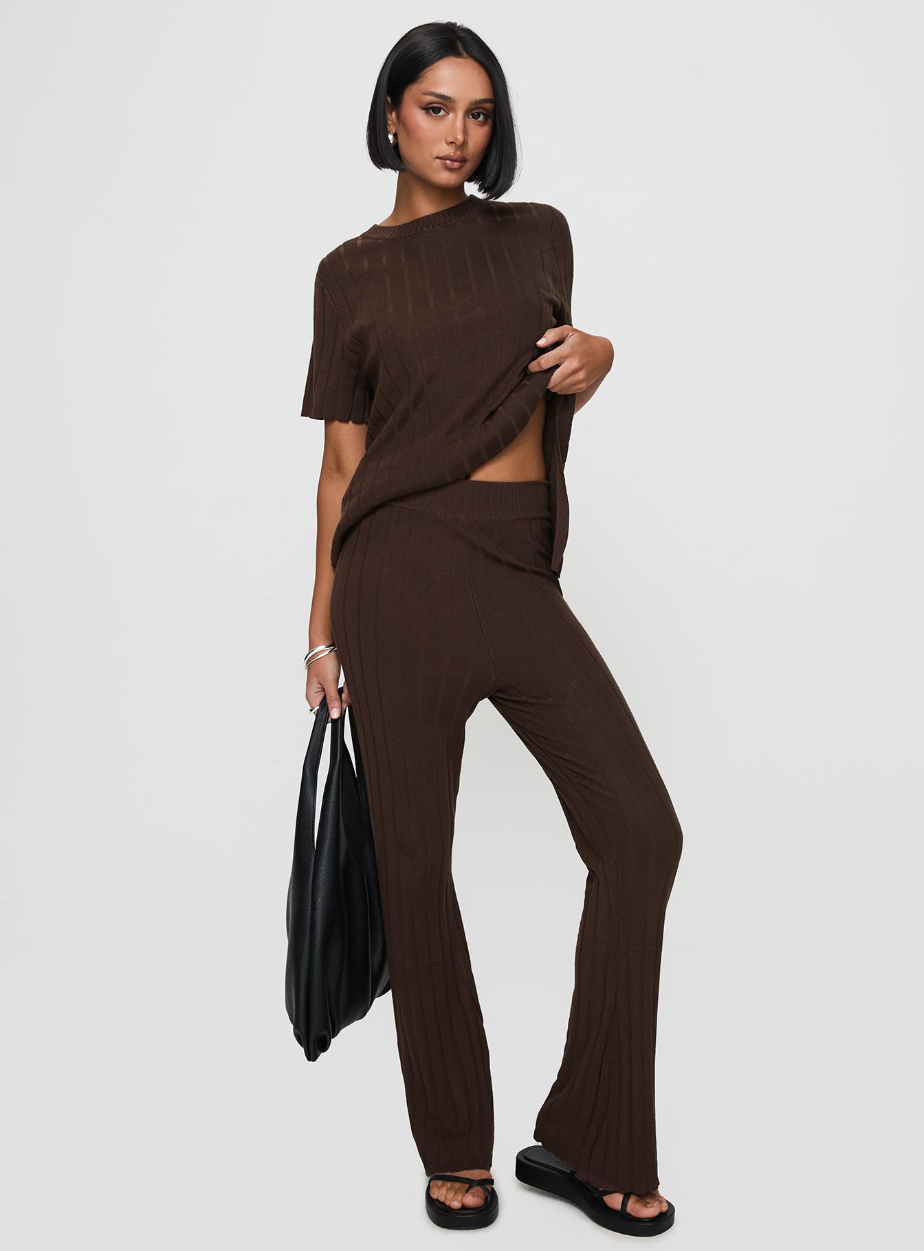 front view of model wearing Princess Polly Palomia Ribbed Pants Chocolate High Waisted Pants 