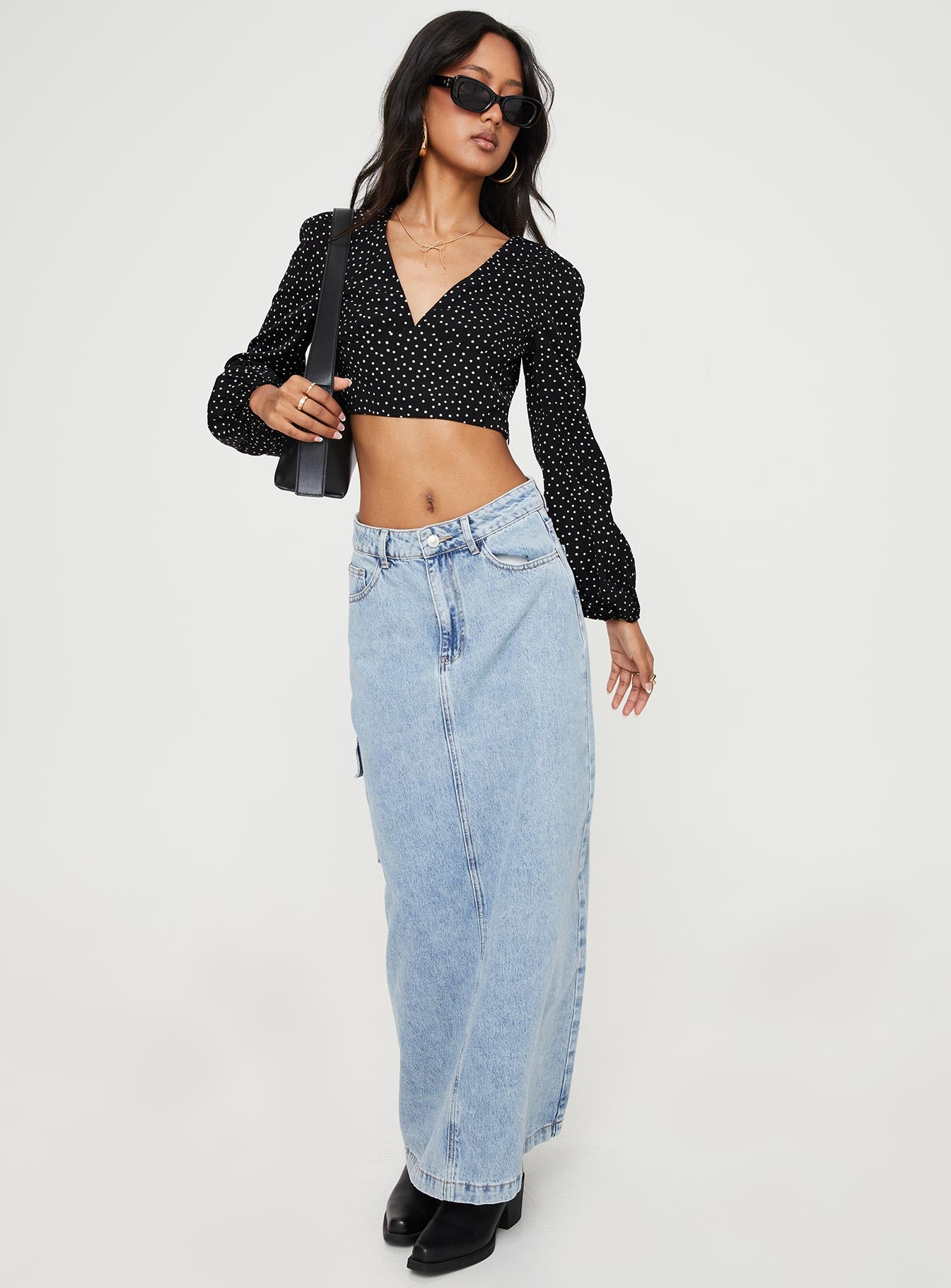 Front view of model wearing  front Princess Polly Half Sleeves Square Neck  Aldon Long Sleeve Top Black