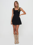 front view of model wearing Princess Polly Dasha Mini Dress Black Square Neck 