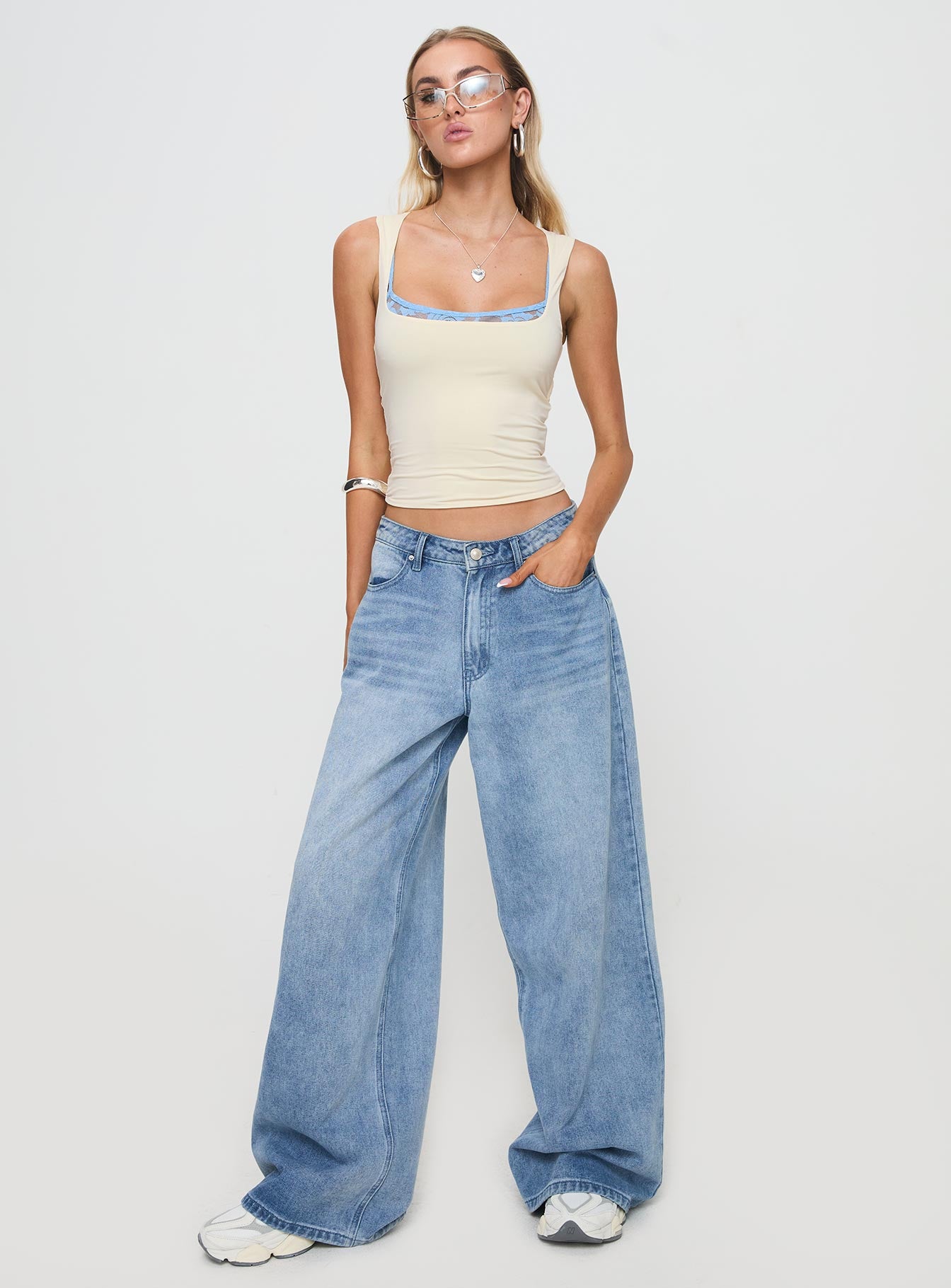 front view of model wearing Princess Polly Back In Time Top Cream/Blue Sleeveless Scoop Neck 