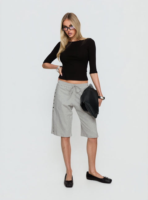 side view of model wearing Princess Polly Kether Longline Basketball Studs Short Grey Marle Mid Rise Pants 