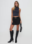   front view of model wearing Princess Polly Barrymore Mini Skort Black Mini Skirts 